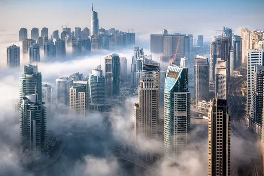 Adv A Hameed office Aspin Tower Dubai checking Emirates ID fines.